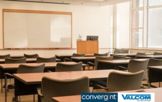 classroom modern setup, chairs, tables, blackboard.