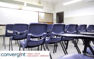 empty classroom with blue chairs