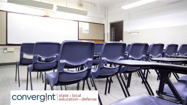 empty classroom with blue chairs